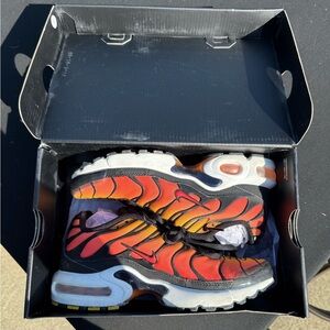 Nike Black and Orange Sneakers with Air Max Cushioning